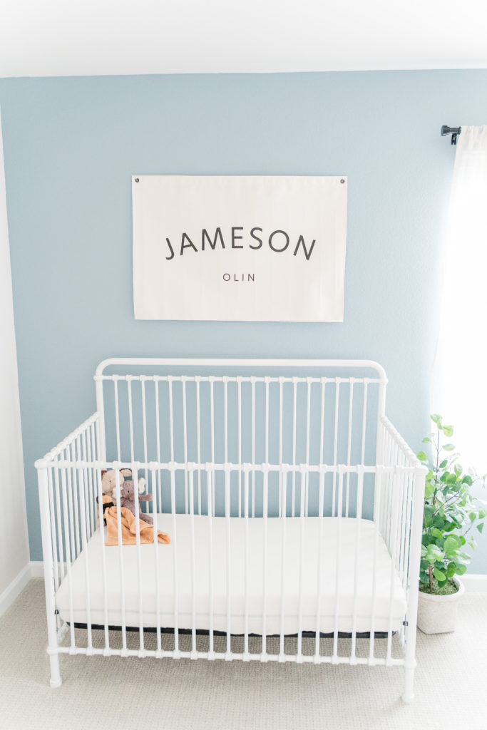 Light and airy newborn boy nursery crib