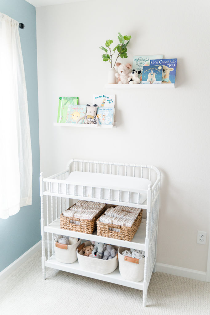 Light and airy newborn boy nursery changing table