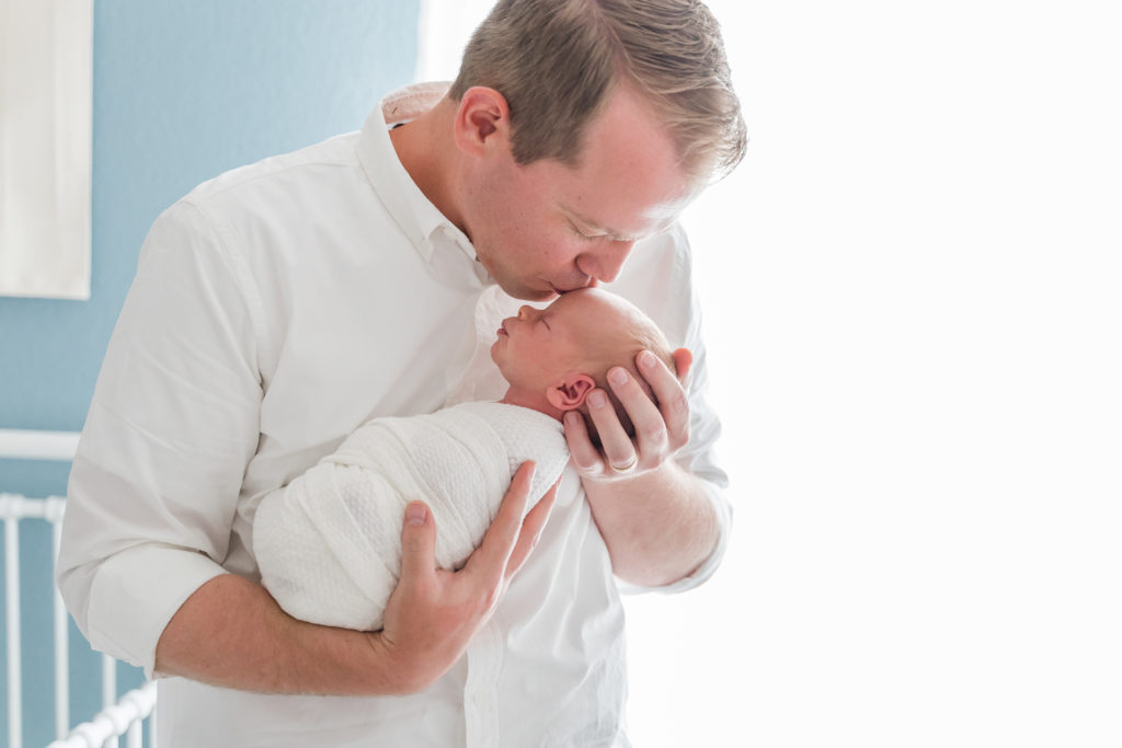 Light and airy newborn boy with dad