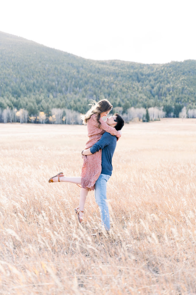 Elk Meadow Evergreen Colorado Engagement Pictures Pick up Kiss
