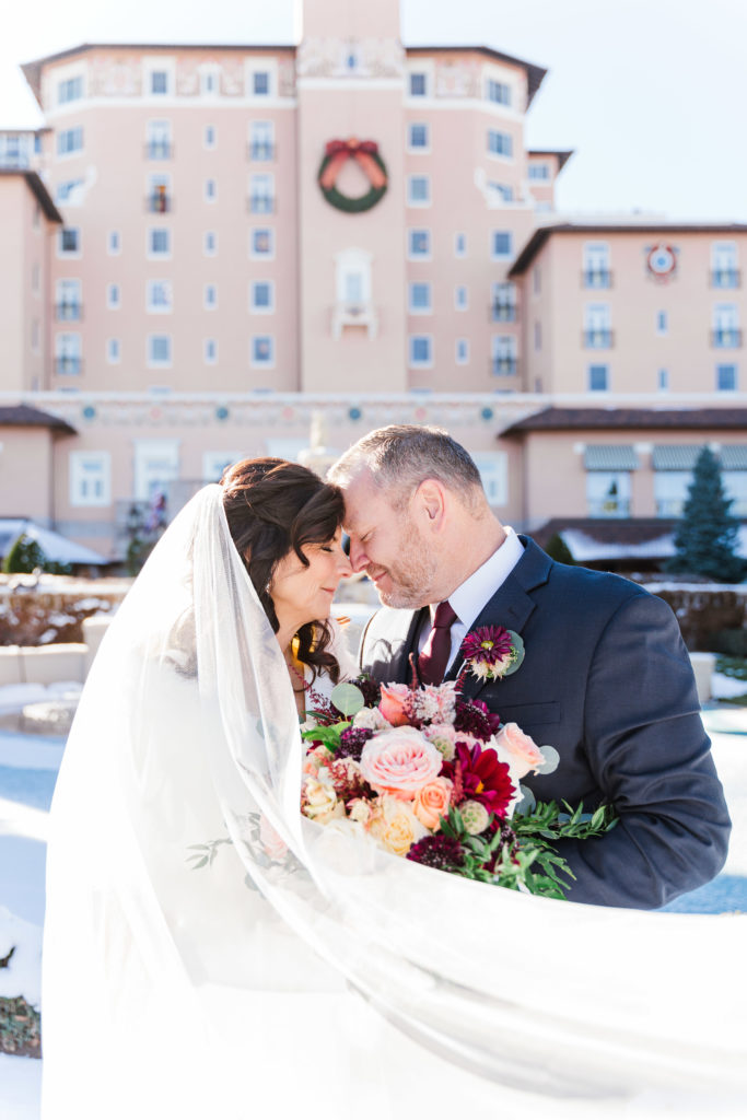 Winter Wedding at The Broadmoor Colorado Springs Veil Swoop 
