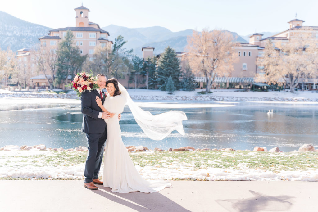 Winter Wedding at The Broadmoor Colorado Springs Lake Bride and Groom Portrait 