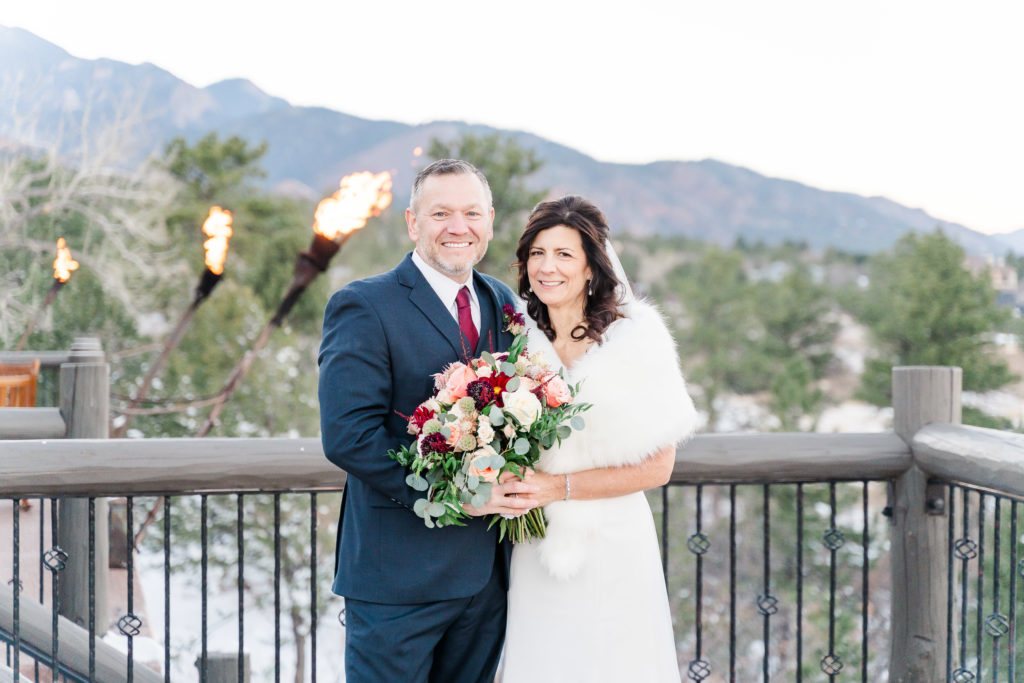 Winter Wedding at The Broadmoor Colorado Springs Reception Cheyenne Lodge Balcony Bride and Groom 