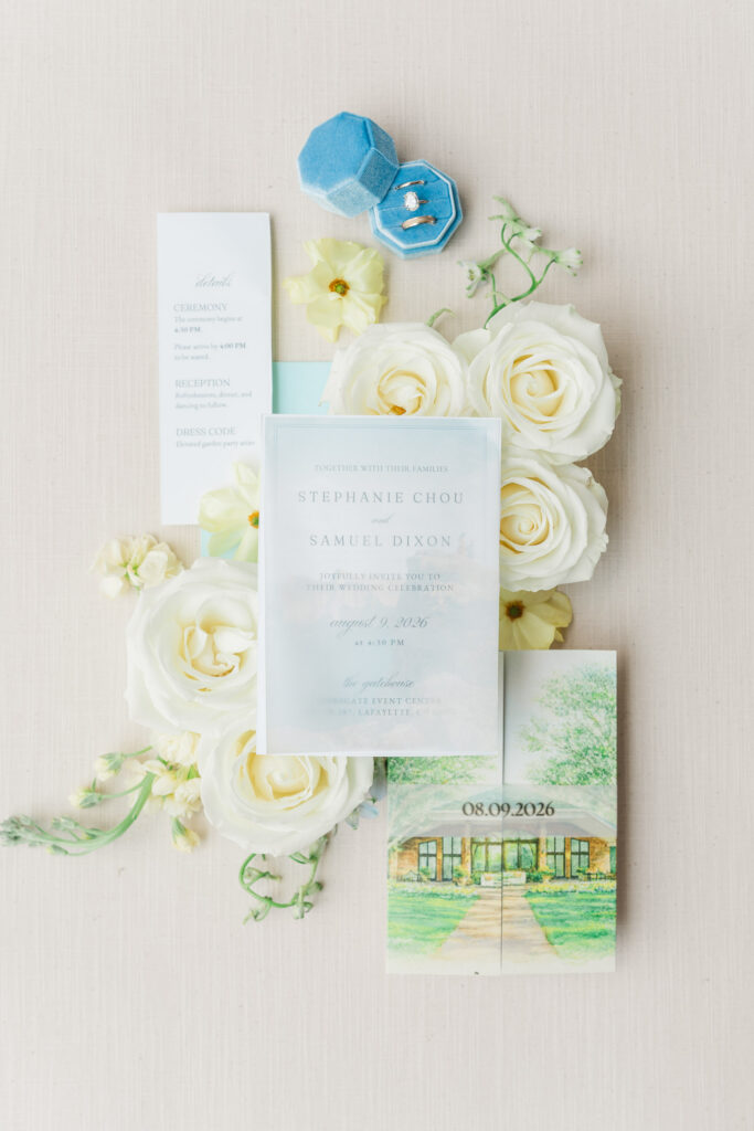 Wedding invitation suite with white flowers and blue details
