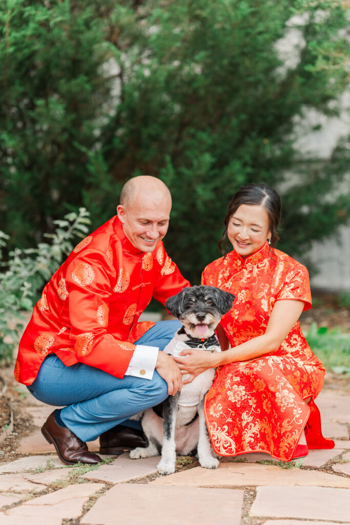 Stephanie and Sam with Lulu in traditional red Chinese wedding attire