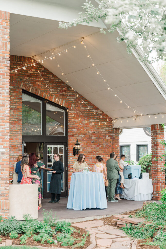 Cocktail hour outside the brick Gatehouse reception space